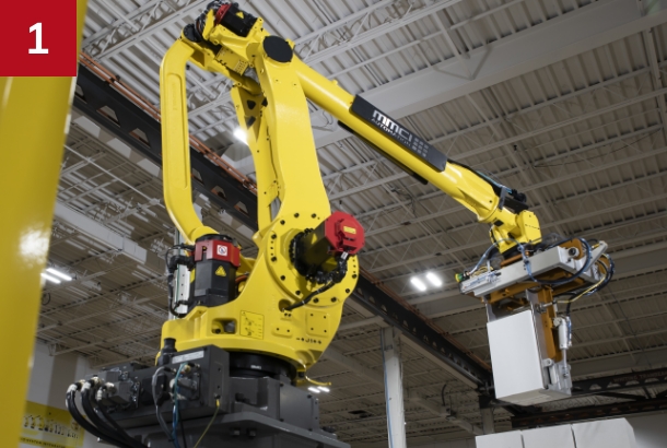 Robotic arm palletizing boxes