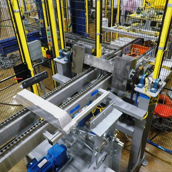 Ingots Enter the Cell on Chain Conveyor